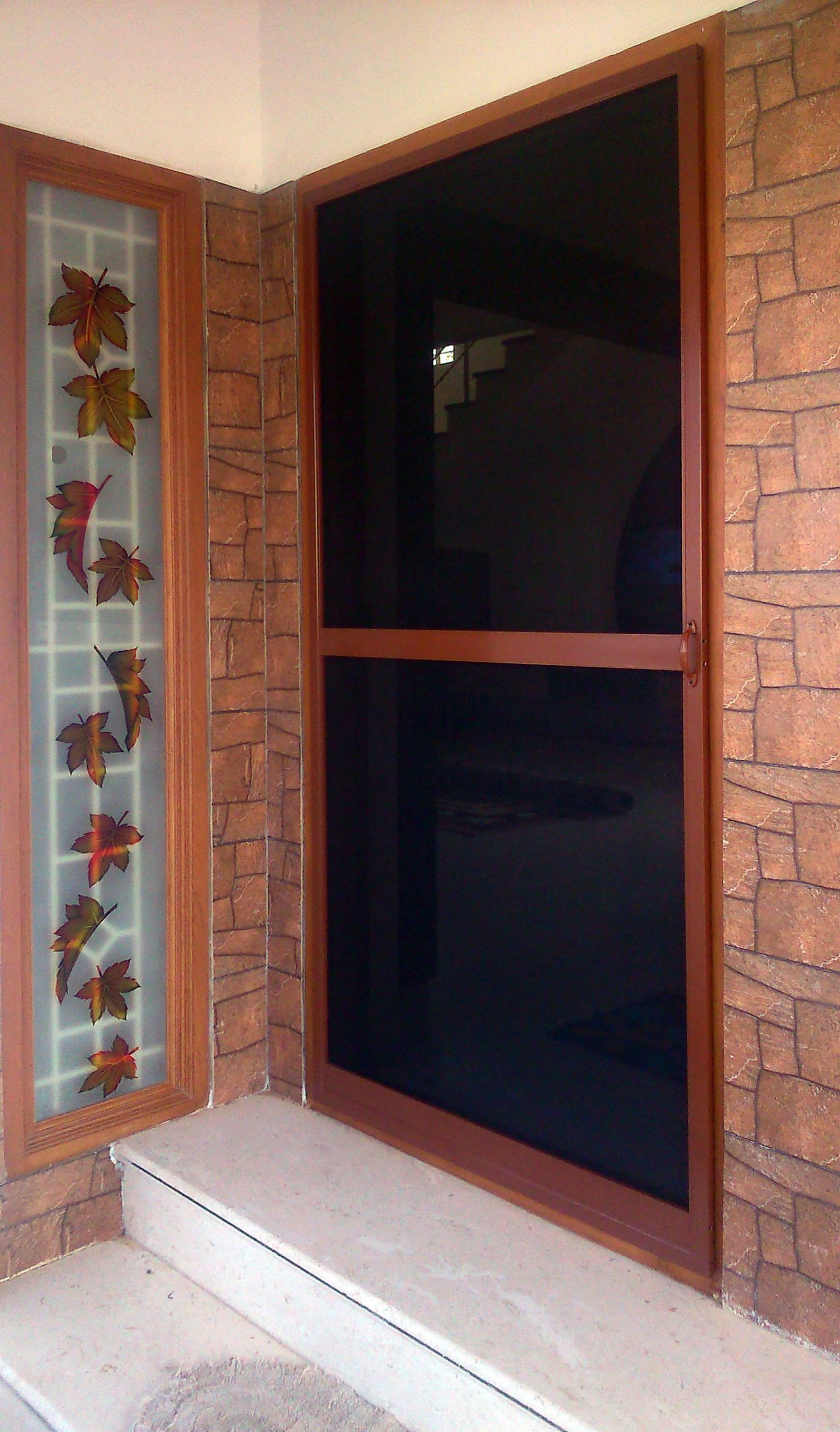 Powder-Coated security door installed by Maple Blinds