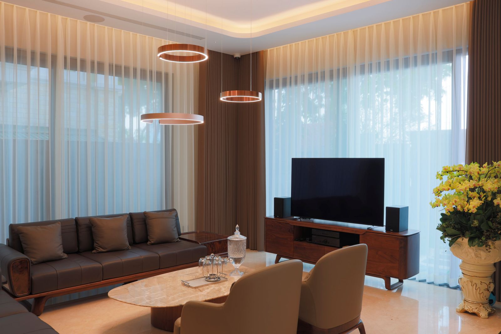 Layered sheer curtains in a luxury lounge